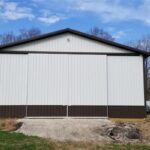 Sliding on pole barn