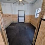 Inside of horse barn stall