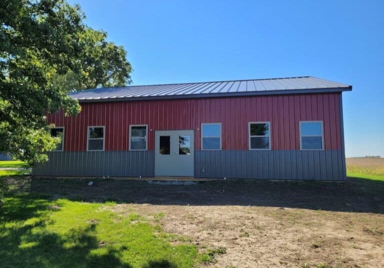 Front view of red and grey pole barn